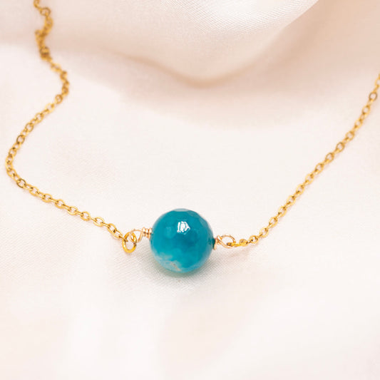 Blue gemstone bead necklace with dainty, gold-plated stainless steel chain.