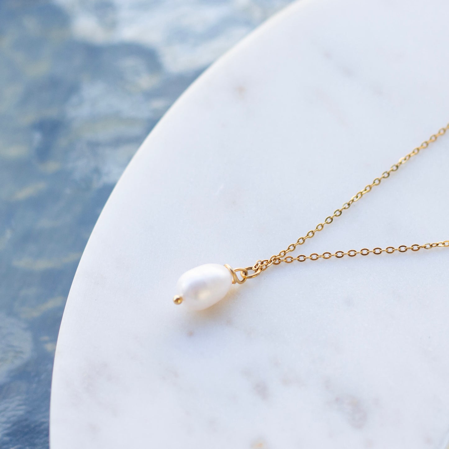 Freshwater pearl necklace with dainty gold-plated stainless steel chain.