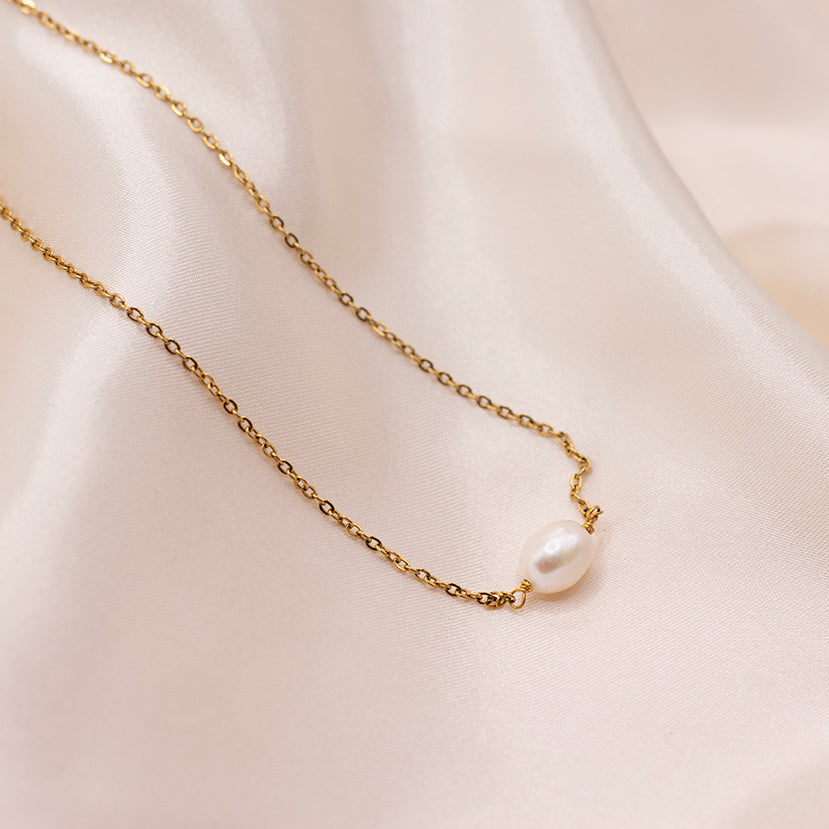 Minimalist pearl necklace with dainty gold plated chain.