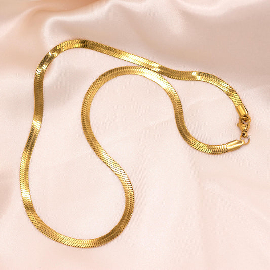 Gold herringbone snake necklace with gold plated stainless steel.